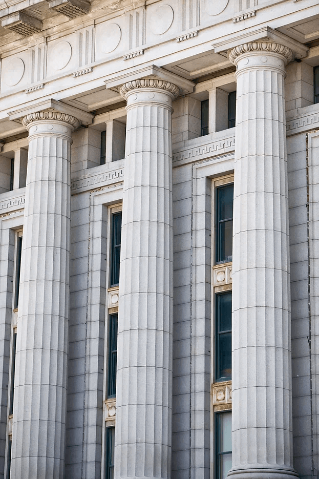 Classical building with columns representing TLG's structured approach to e-learning